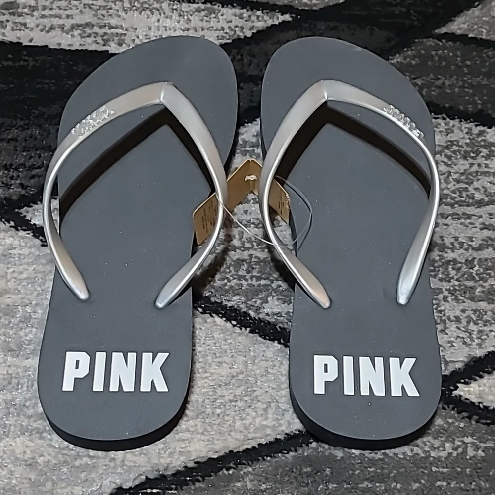 VS PINK BLACK SILVER LOGO FLIP FLOPS SANDALS